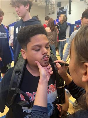 student at face painting